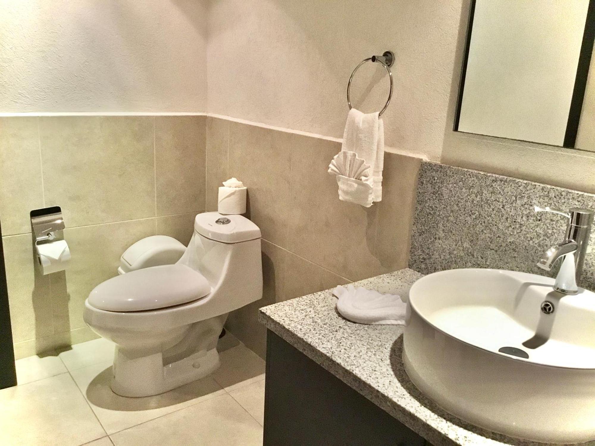 Apartamentos Grand Venetian Пуерто-Вальярта Номер фото