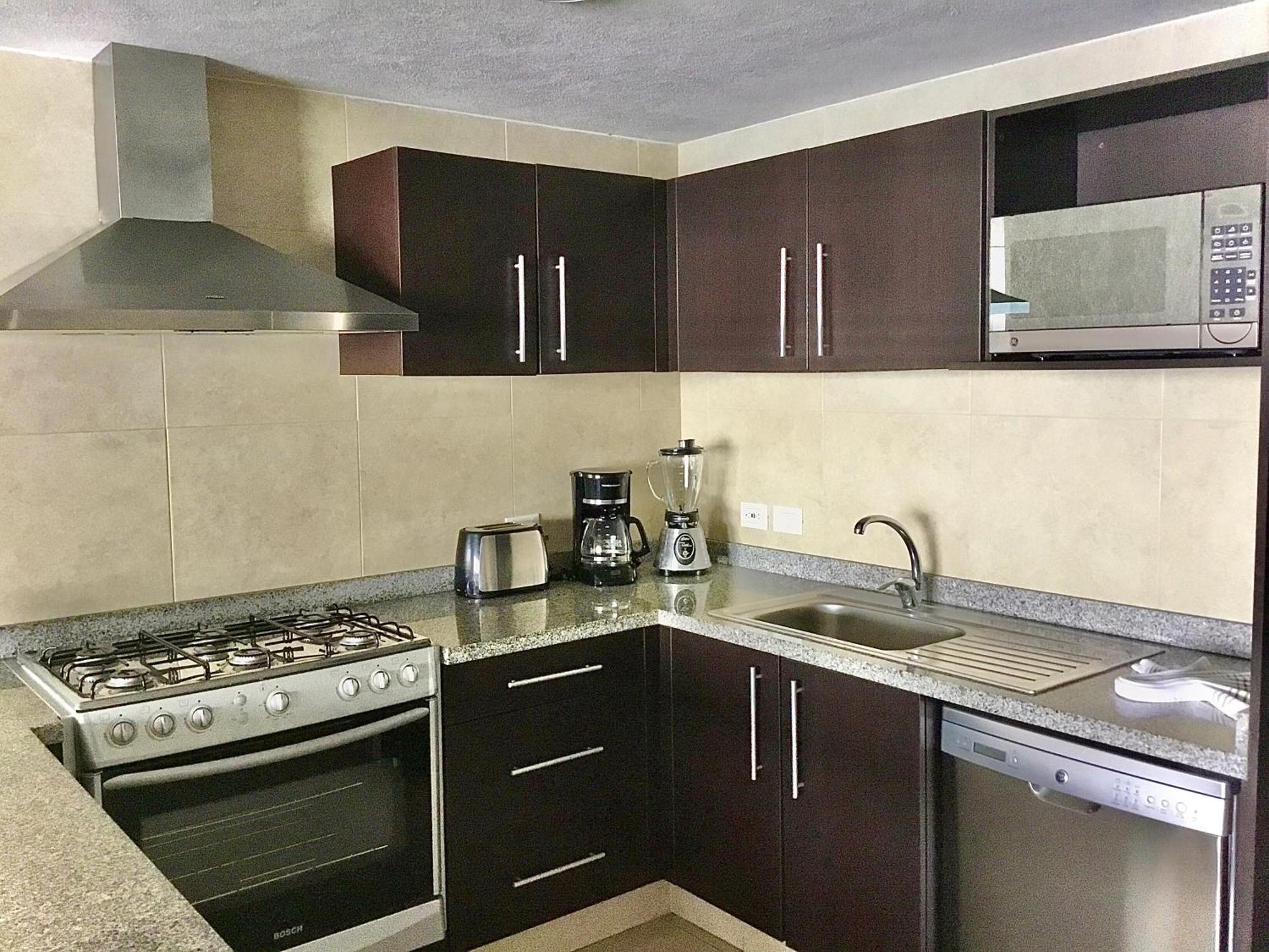 Apartamentos Grand Venetian Пуерто-Вальярта Номер фото